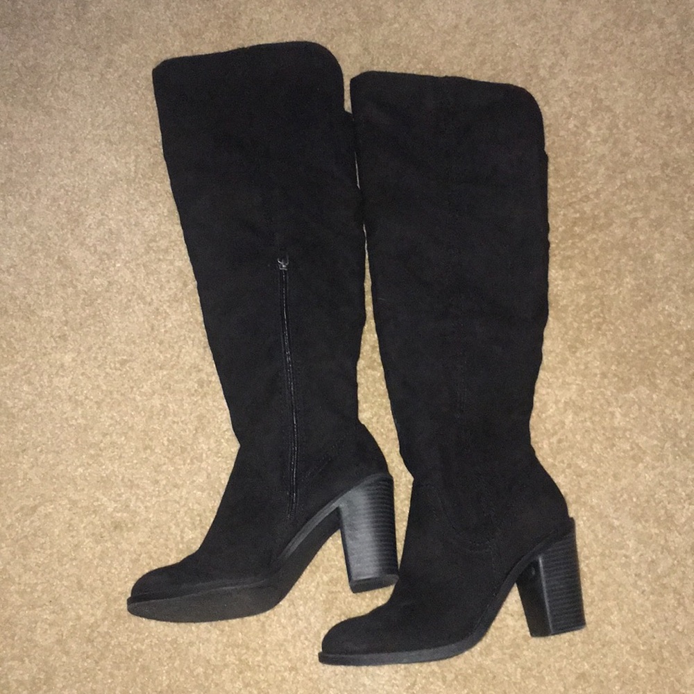Black over-the-knee boots with heels